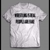 WRESTLING IS REAL PEOPLE ARE FAKE PRO WRESTLING SHIRT