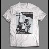 LIBERATE OUR MINDS BY ANY MEANS NECCESARY MALCOLM X DISTRESSED DESIGN SHIRT