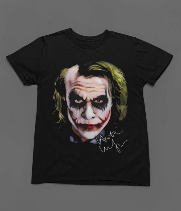 mockup-of-a-round-neck-gildan-t-shirt-lying-on-a-colorful-surface-m30581 (3)